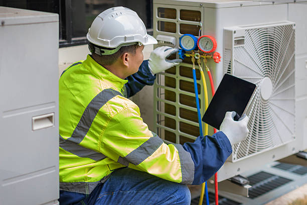 Professional Heat Pump Repair technician working in Gambrills, MD